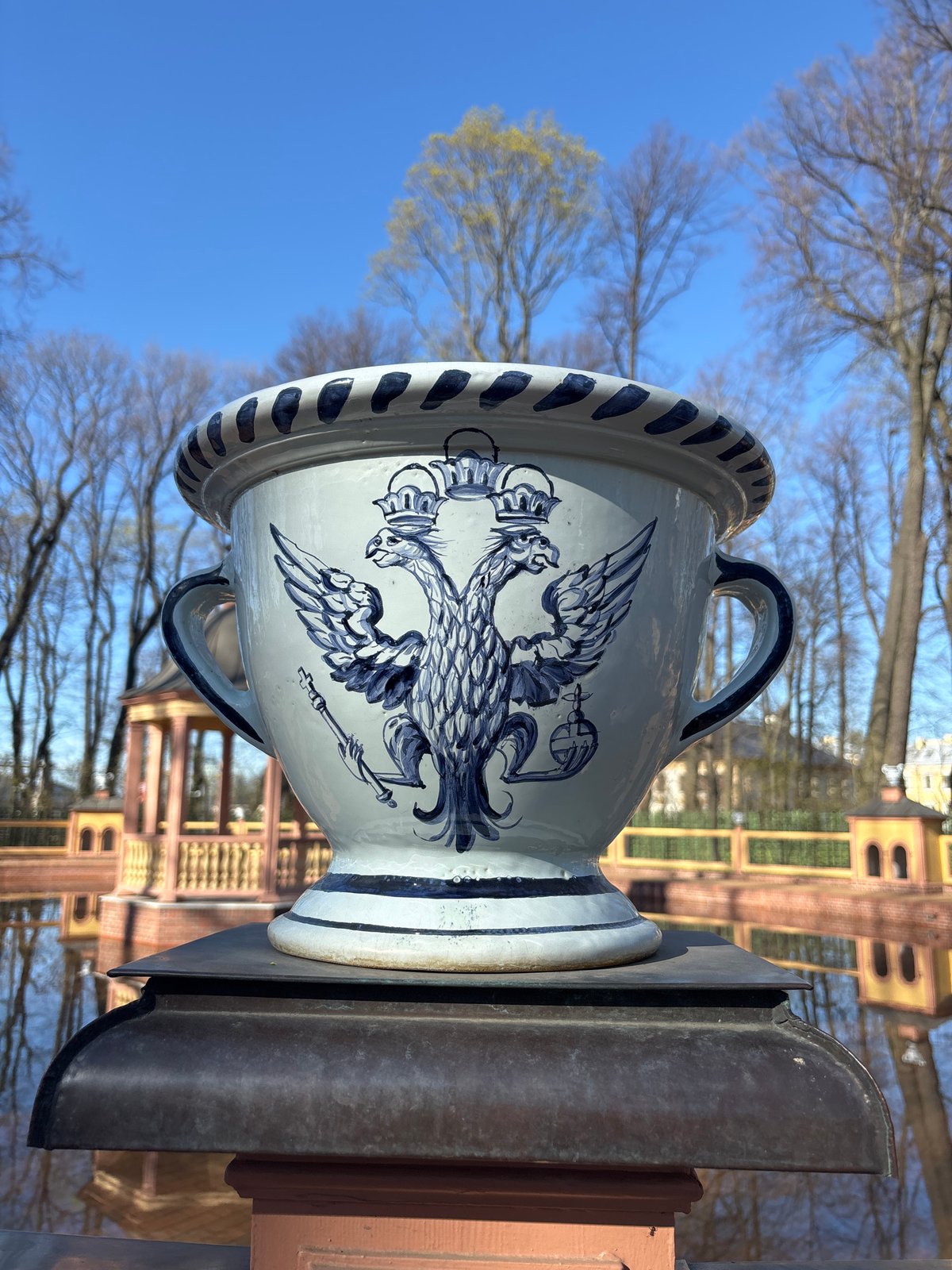 Tourist documents walking tour through Saint Petersburg's historic Summer Garden