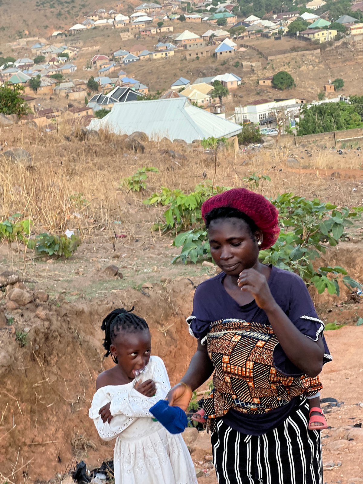 Woman interacts with youth in Jos, Nigeria