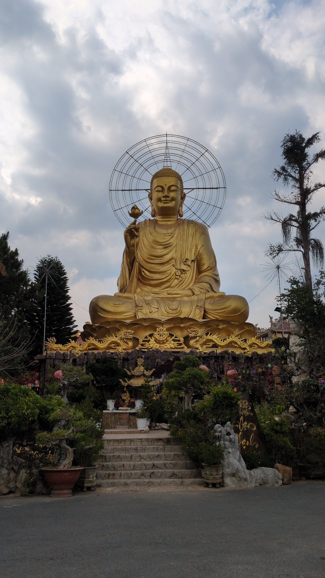 Golden Buddha statue photographed in Đà Lạt, Vietnam