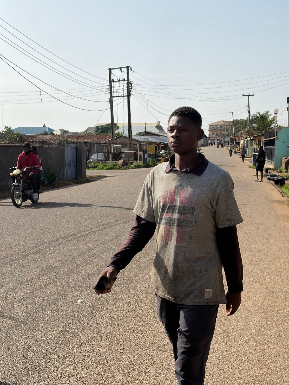 Morning street life documented across Jos, Nigeria neighborhoods