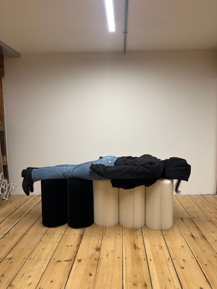 Woman photographed in various poses at London indoor location