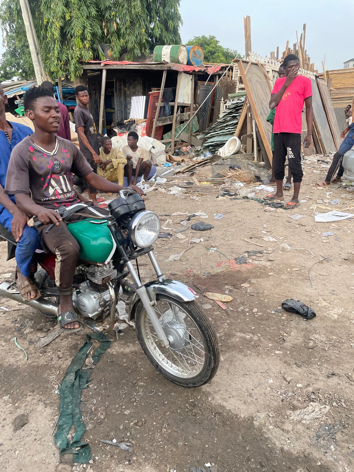 Morning scenes documented in Abuja informal settlement community