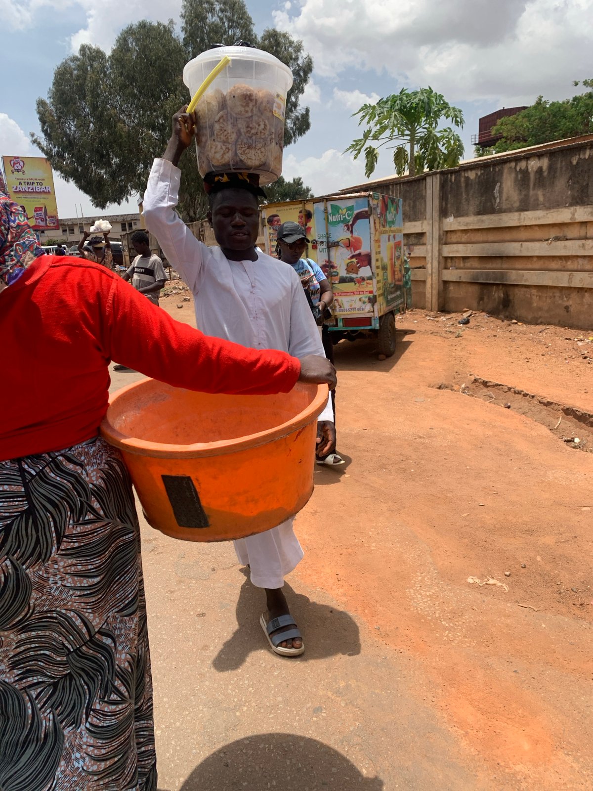 Daily market life captured across Jos, Nigeria street vendors