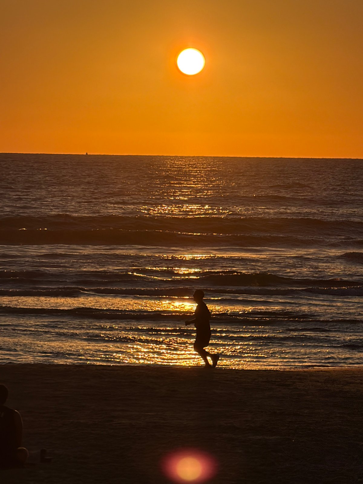 Vibrant sunset observed over Tel-Aviv Mediterranean coast