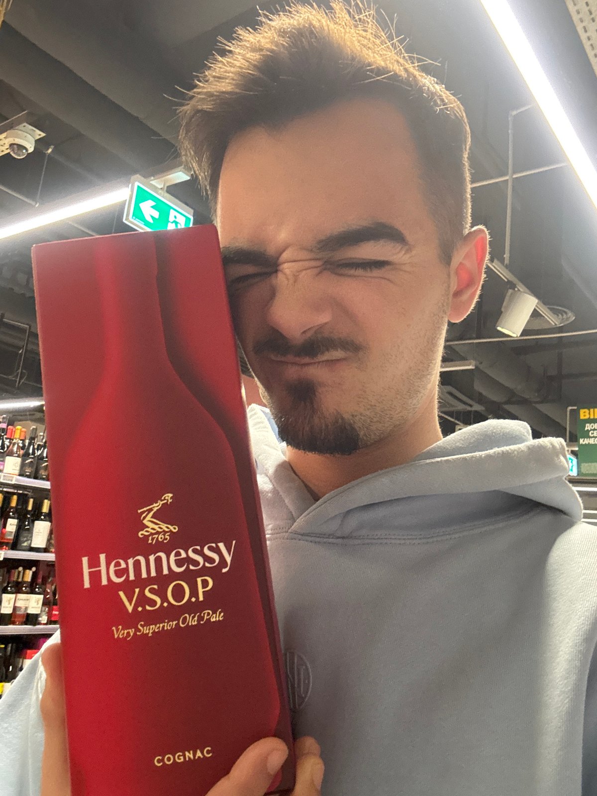 Man with Hennessy cognac box photographed in Sofia