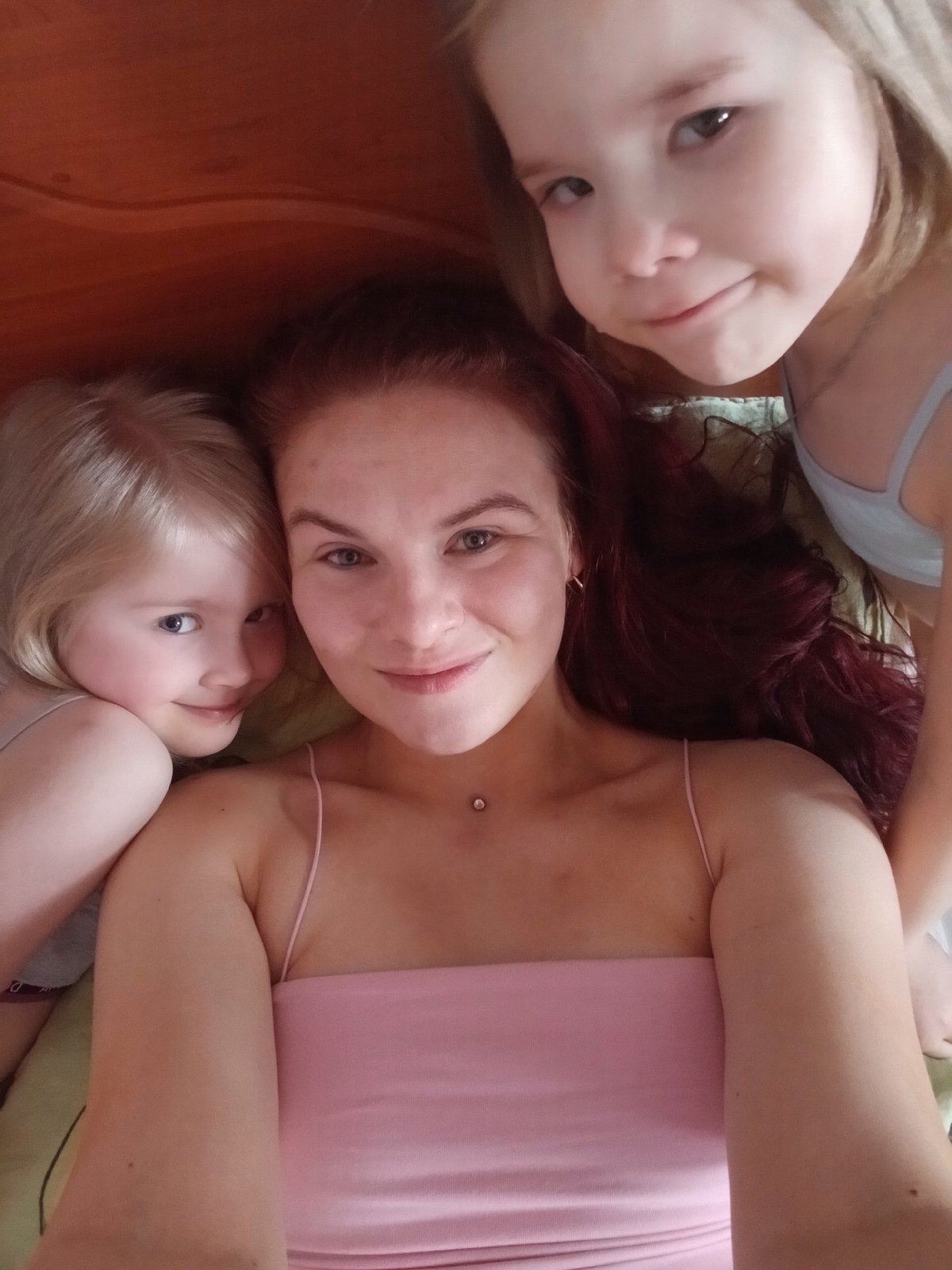 Family photographed in casual domestic moment in Chaikovsky, Russia