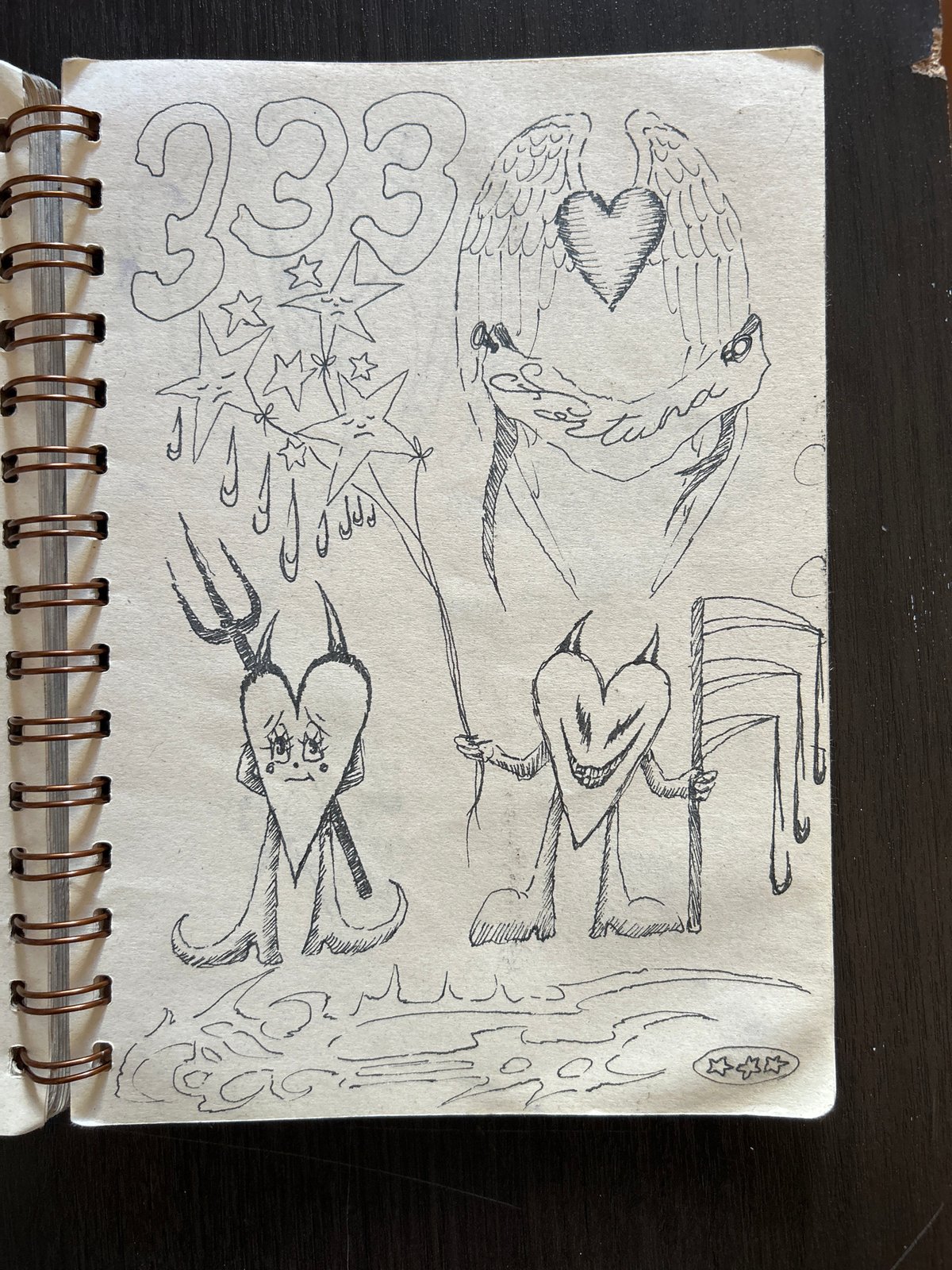 Artist's sketchbook and sunny Buenos Aires street documented