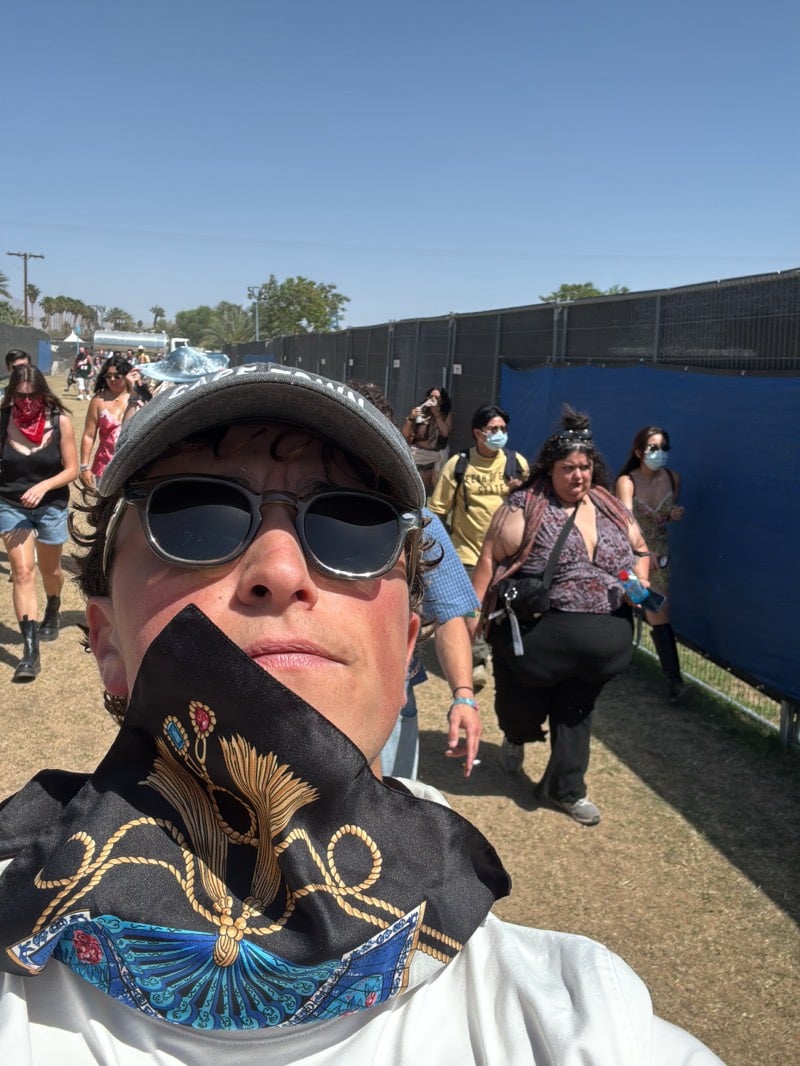 Festival crowds gather along pathway in Indio, California