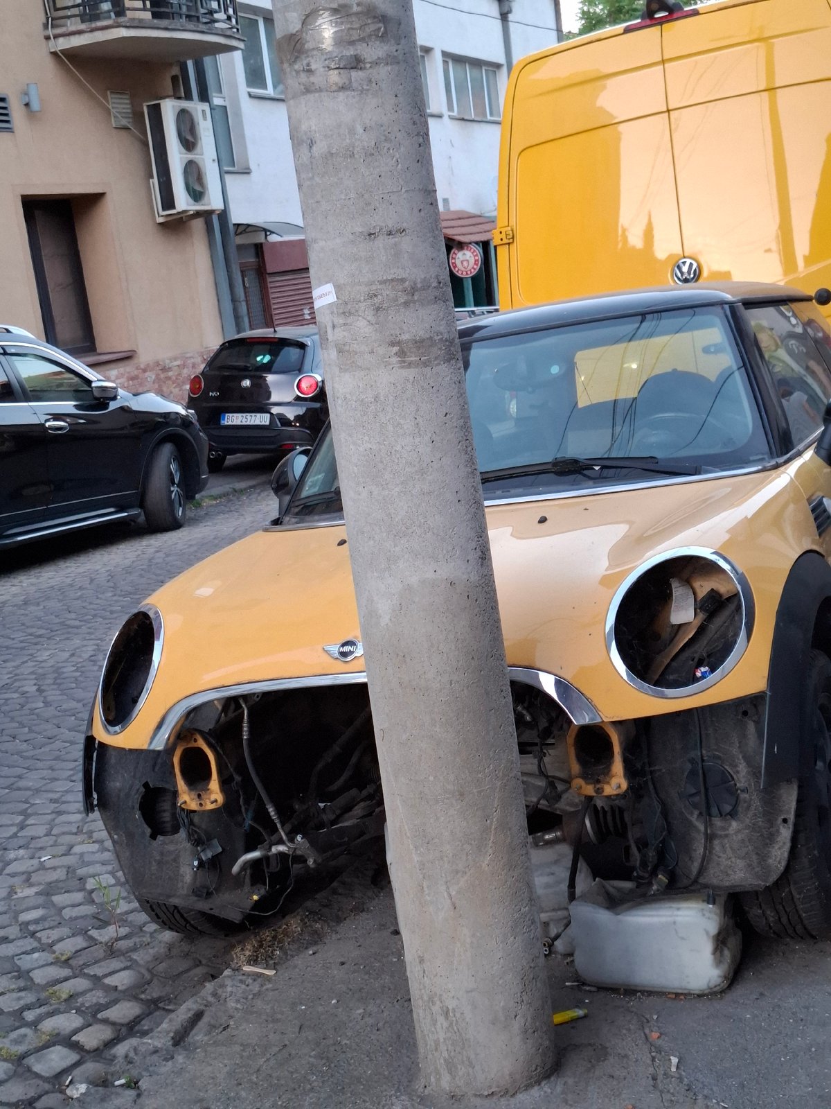 Yellow Mini Cooper severely damaged in Zemun street accident
