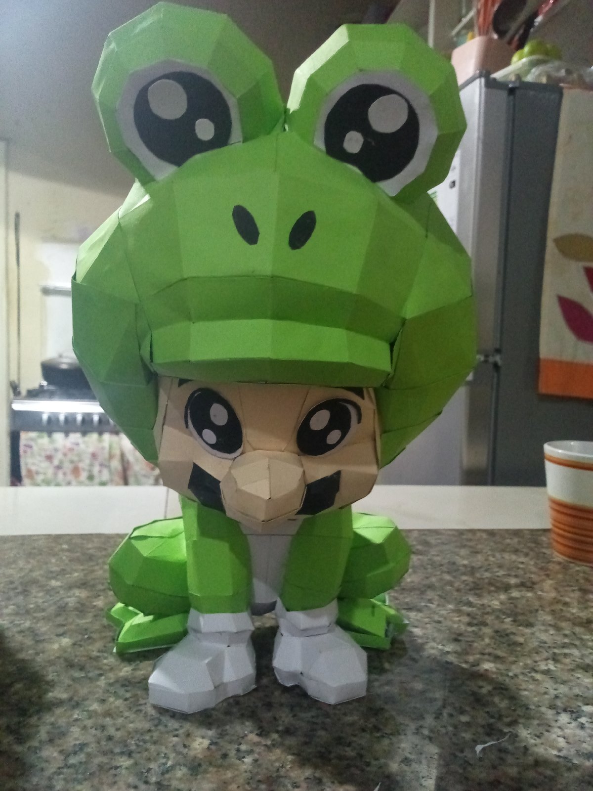 Mario Frog Suit papercraft spotted on Venezuelan kitchen counter