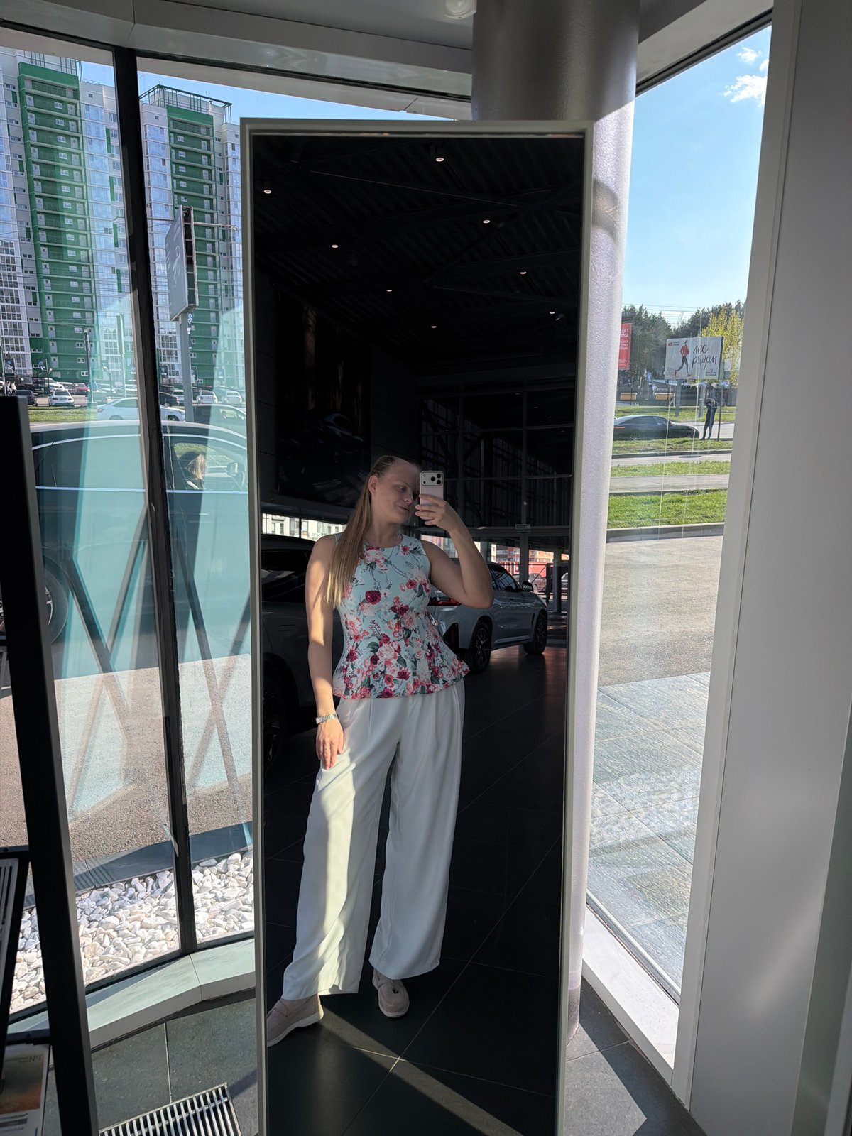 Woman documents shopping trip with selfies across Izhevsk venues