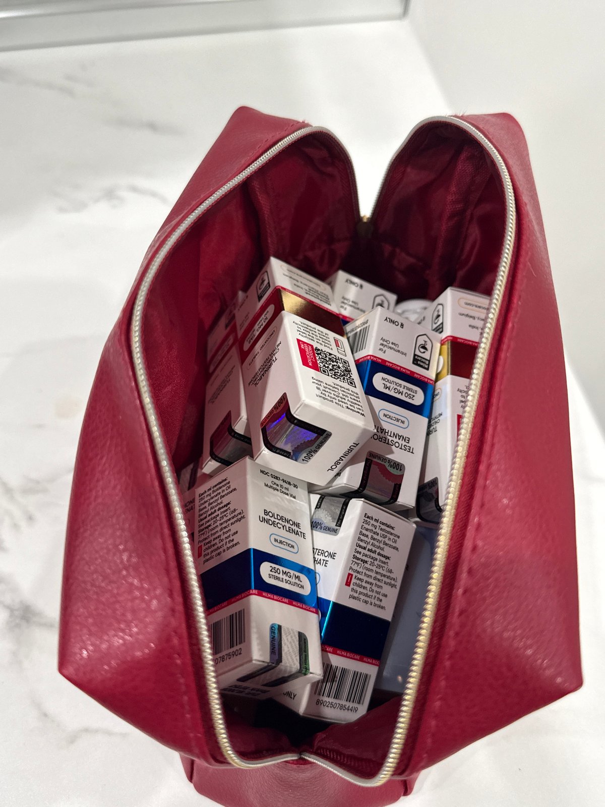 Red bag filled with packaged boxes documented in Burgas