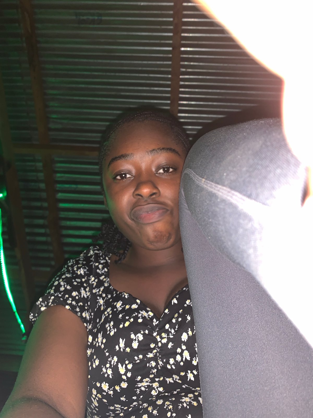 Green-lit nighttime social gathering documented at Nigeria stadium venue