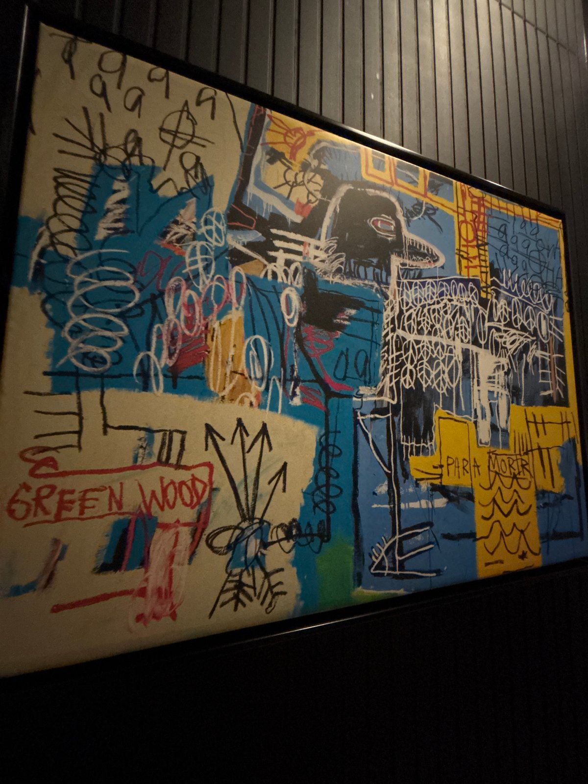 Basquiat-style painting with mixed text observed in Puebla interior