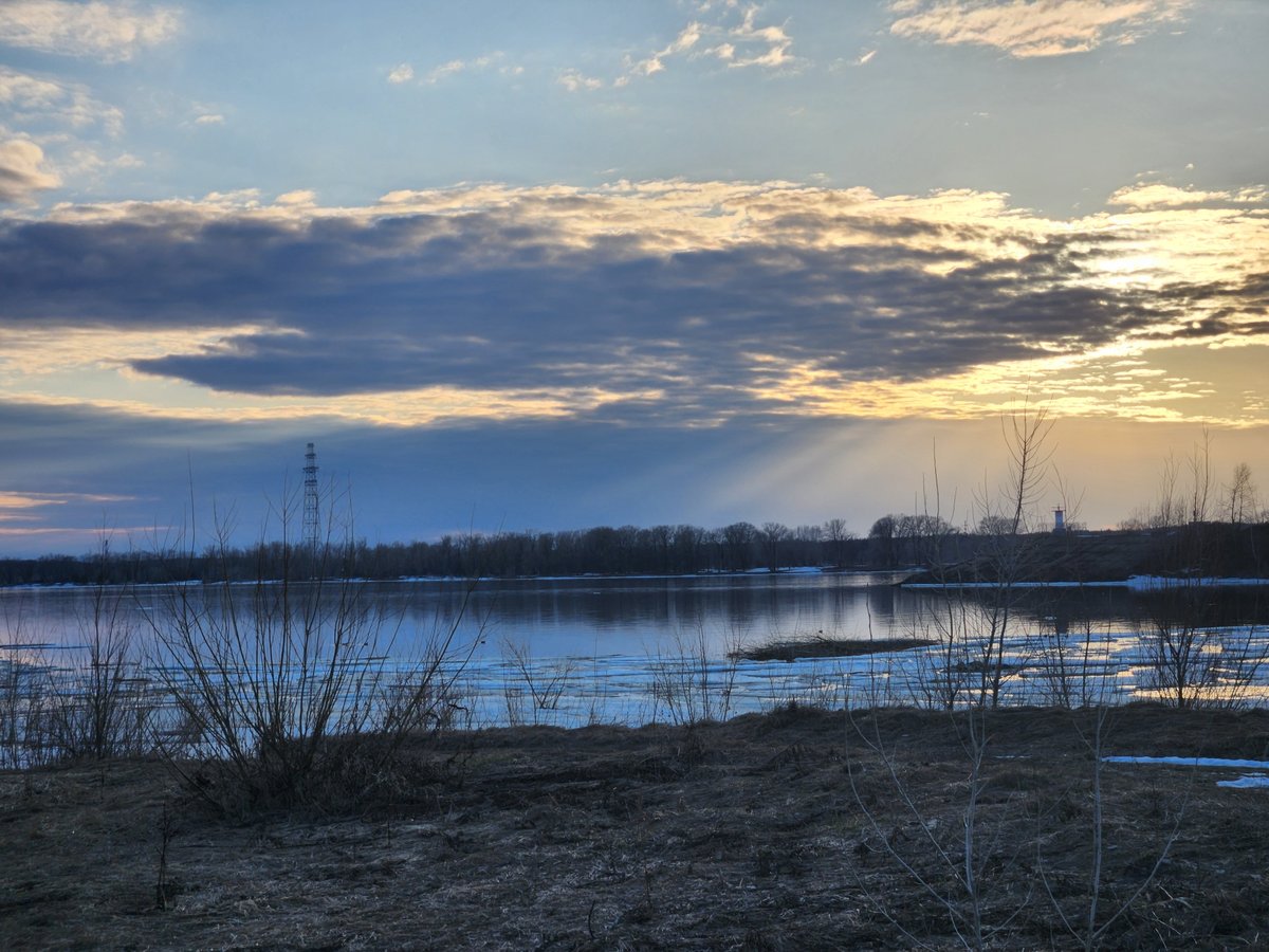 Spring thaw captured in landscape photo showing melting ice