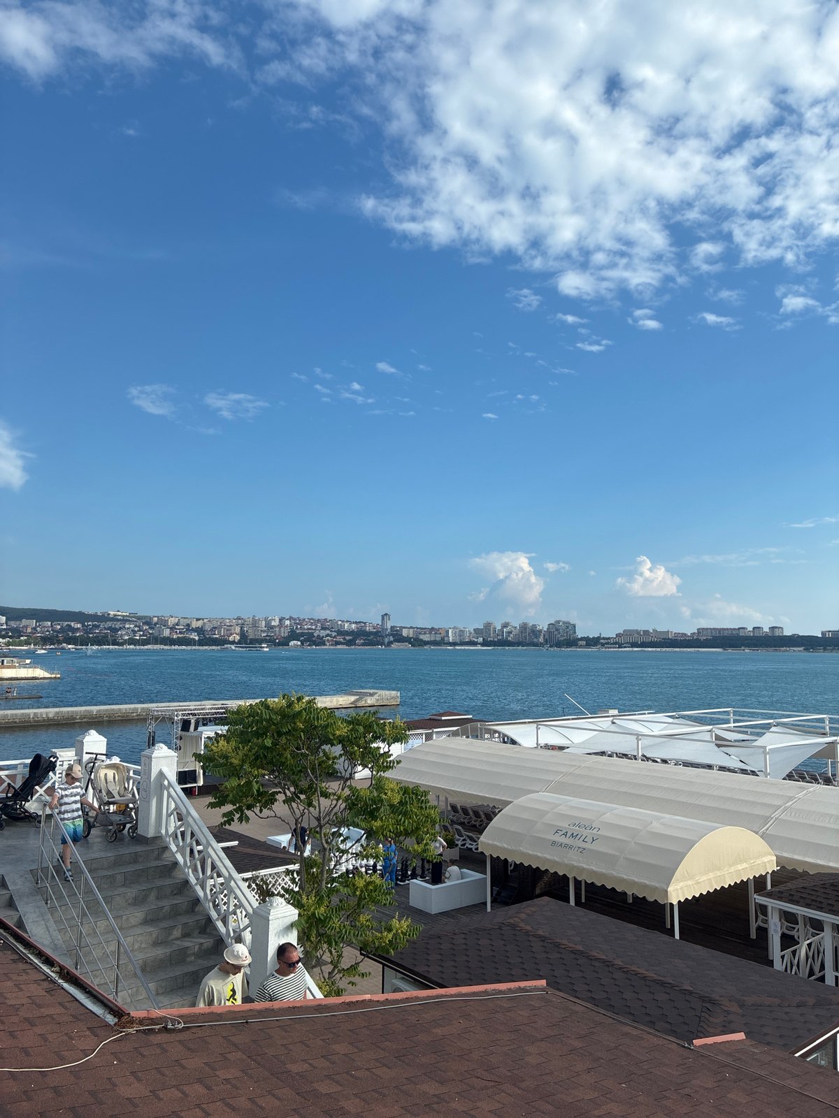 Tourist explores Gelendzhik waterfront attractions and dining over afternoon