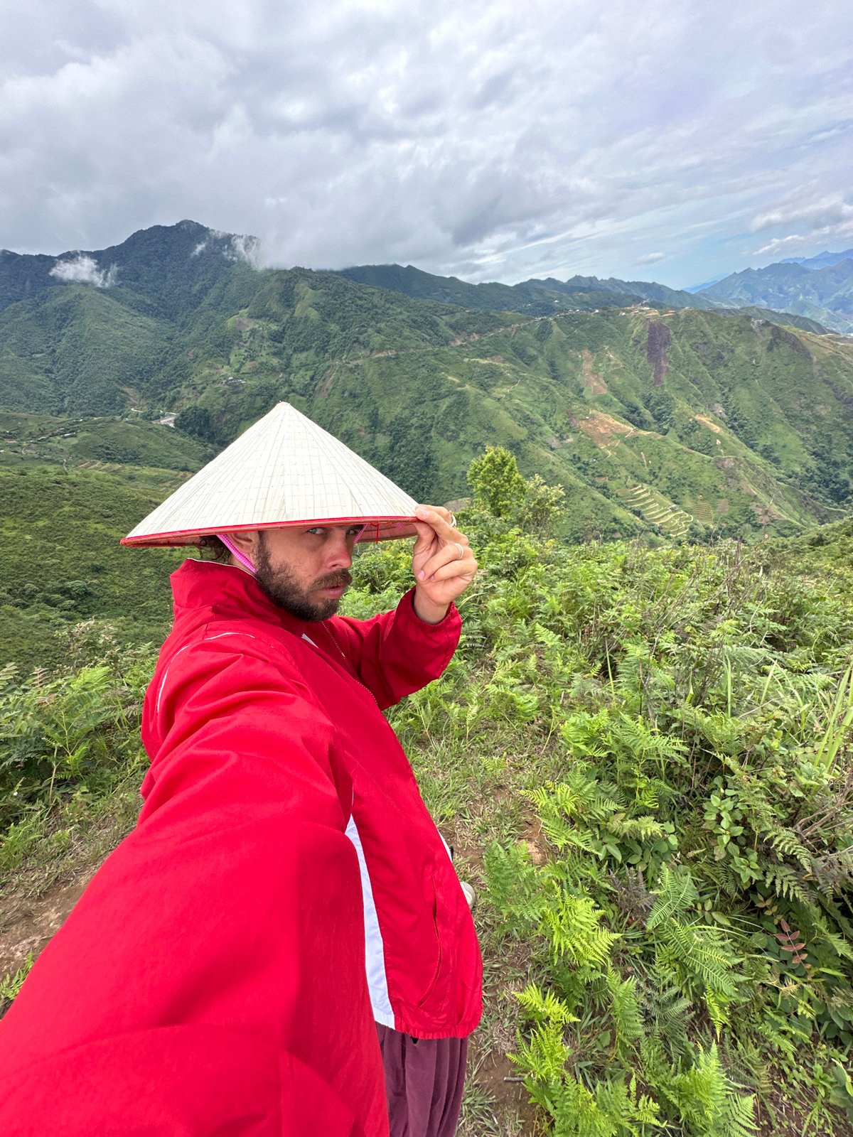 Tourist poses for photos at Vietnam's Tà Xùa terraces