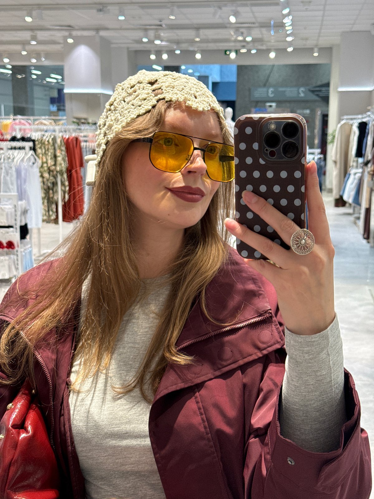 Woman takes dressing room selfies while shopping in Izhevsk