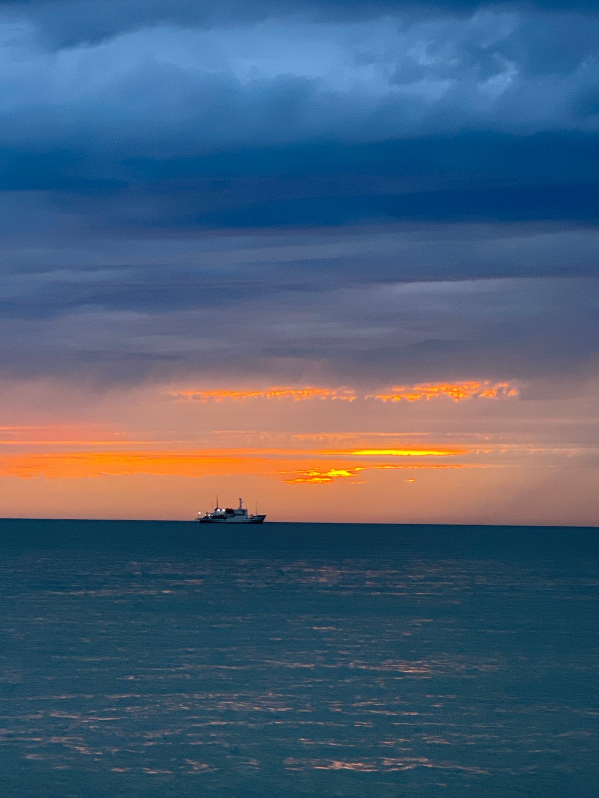 Tourist documents evening stroll through Sochi's seaside attractions