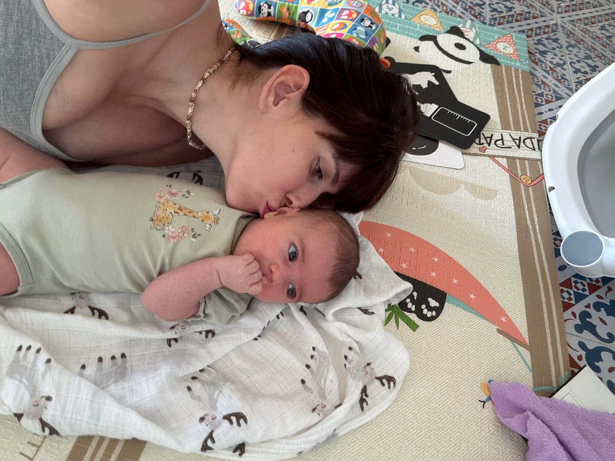 Quiet afternoon cuddles with a baby in Isola delle Femmine