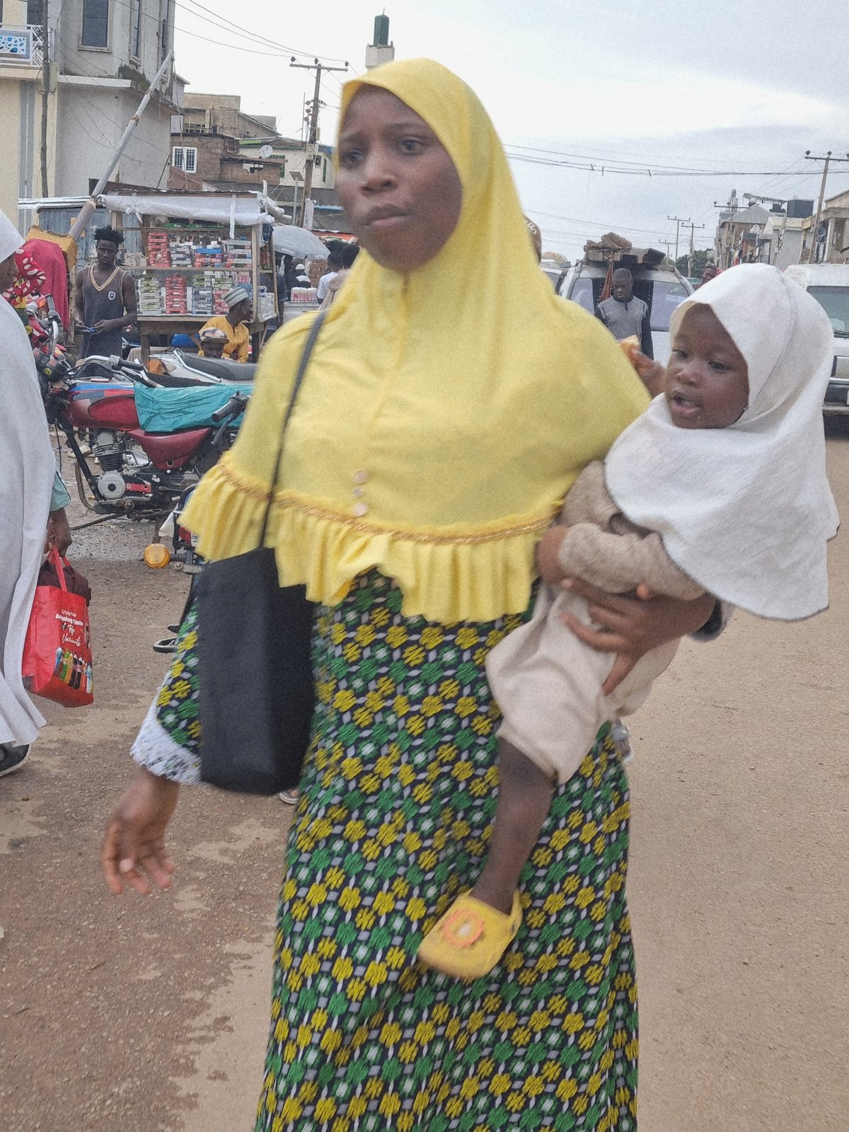 Everyday street and market life moving through Jos, Nigeria
