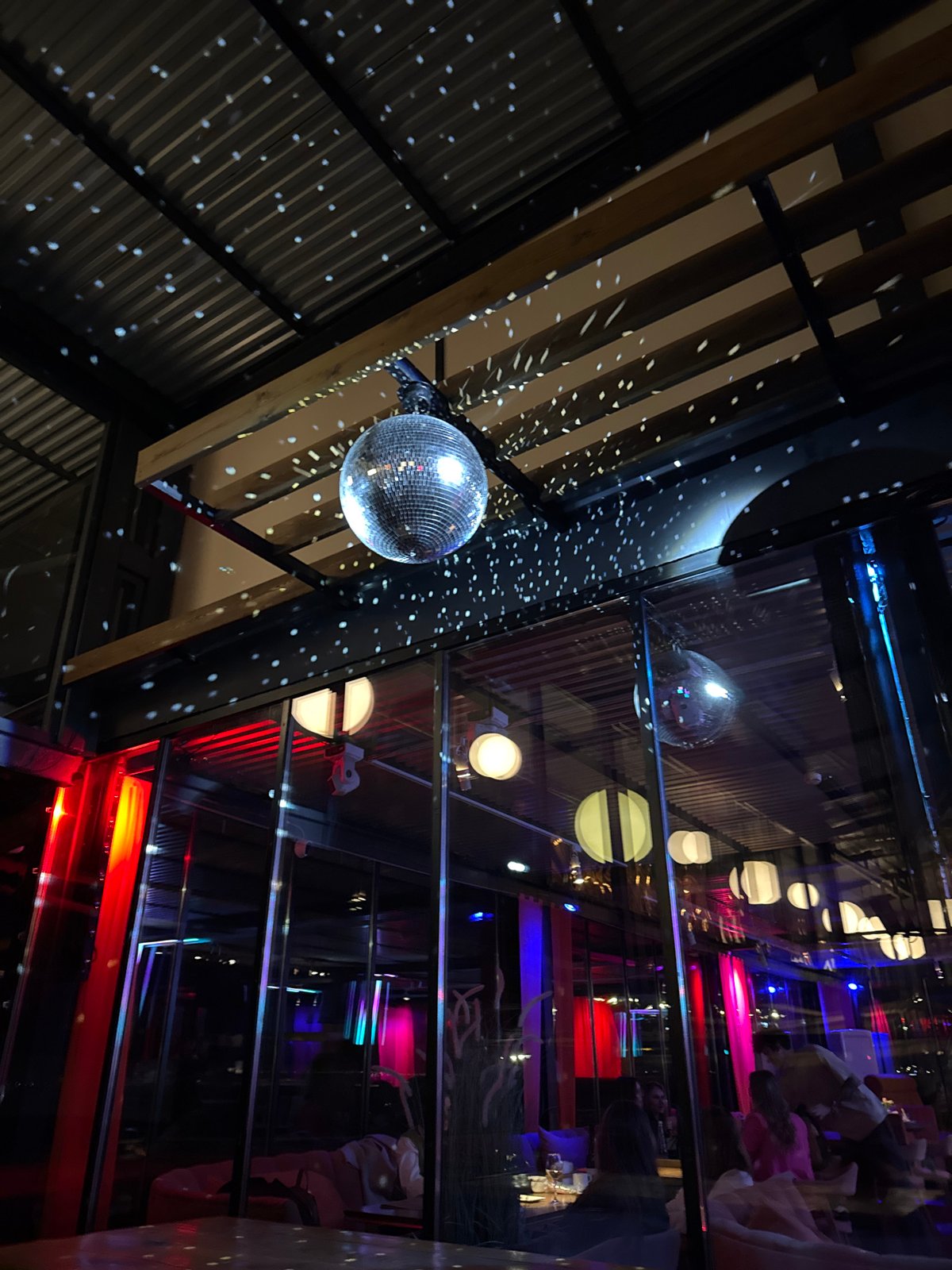 Evening restaurant visit documented with selfies, sushi, sparkling wine