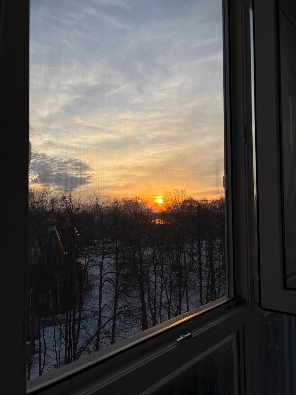 Daily life moments captured across Chaikovsky, Russia during winter afternoon