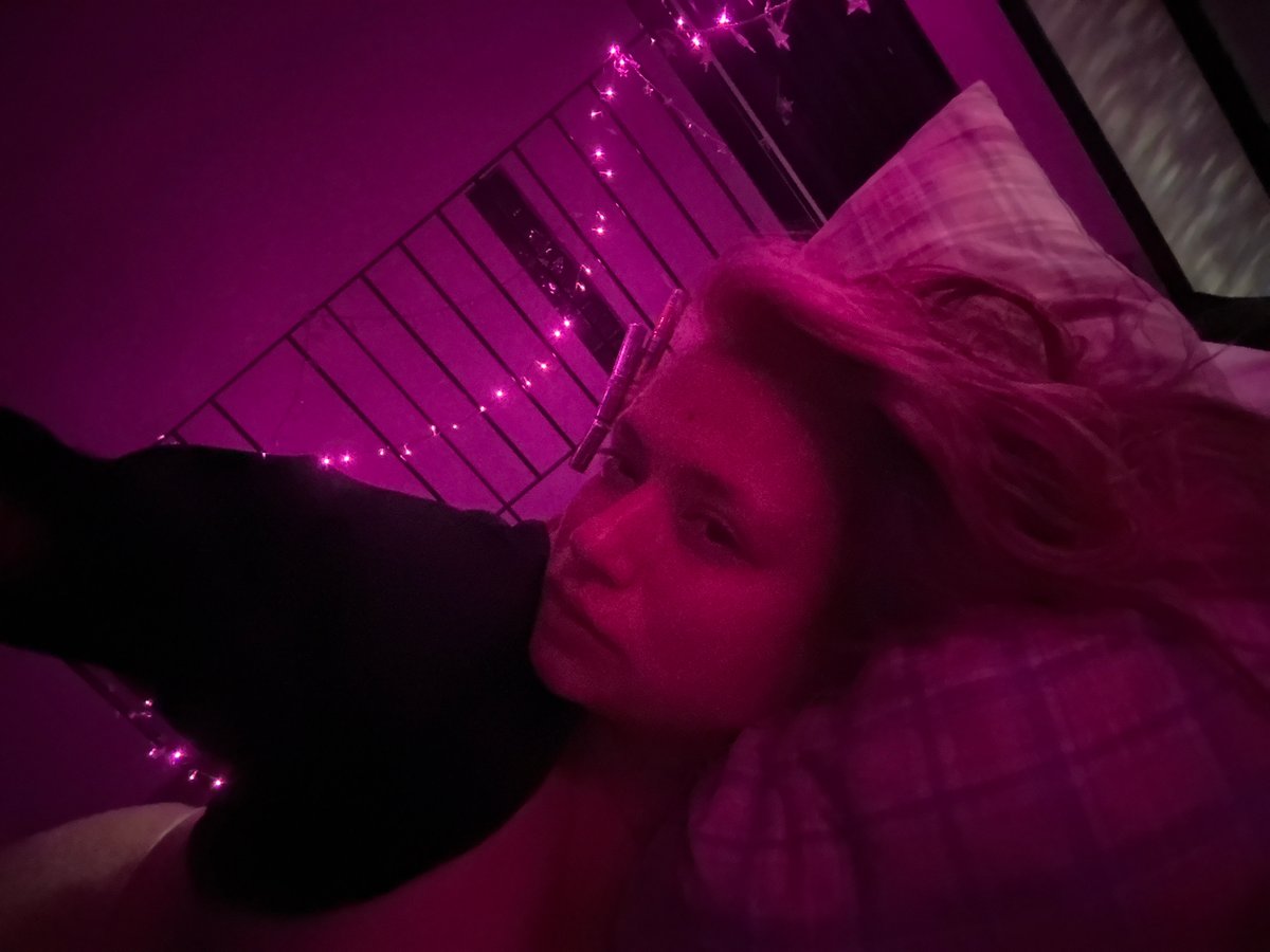 Colorful LED-lit portraits in a Nha Trang bedroom