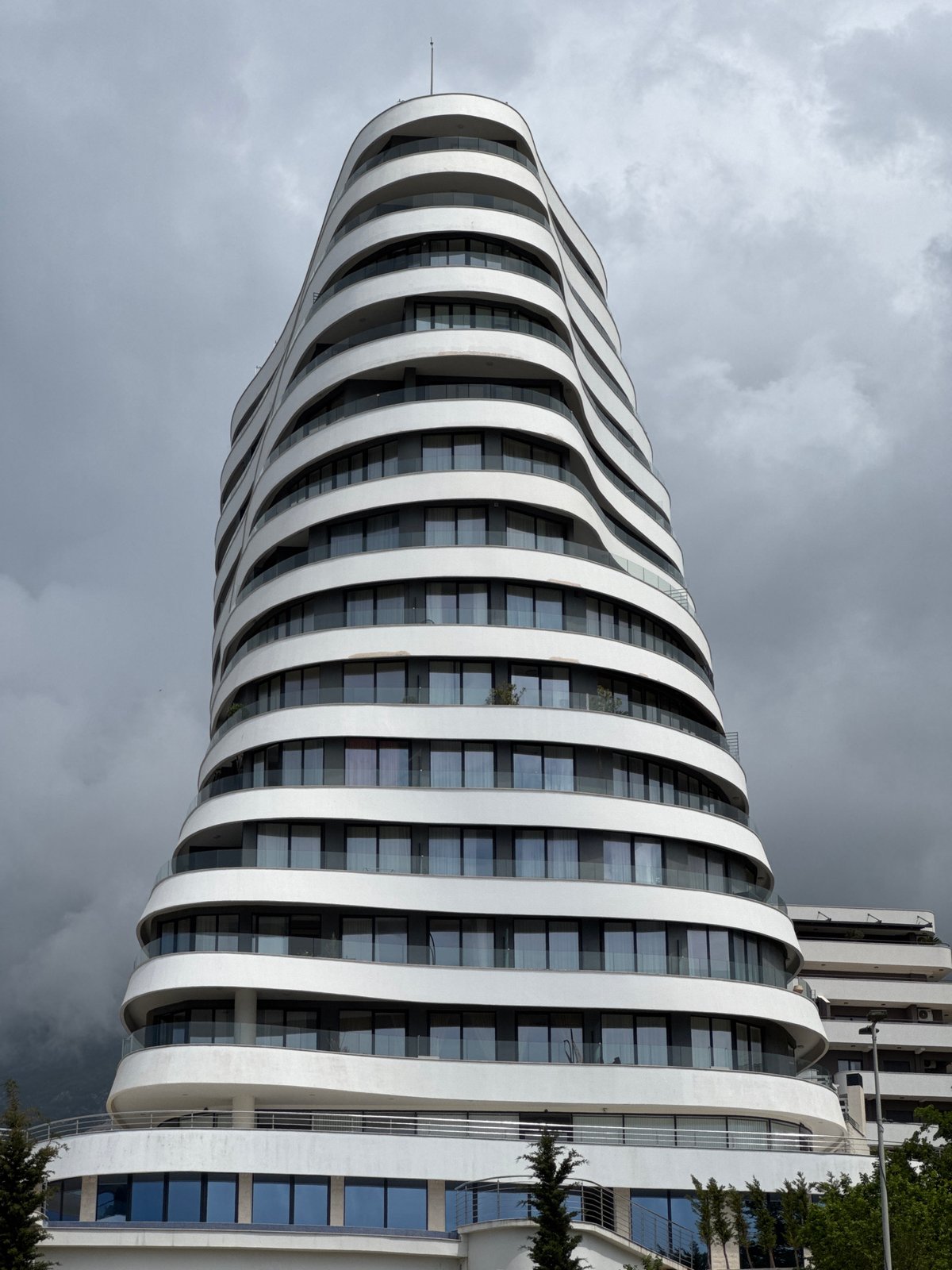 Modern curved high-rise photographed in Boreti, Montenegro