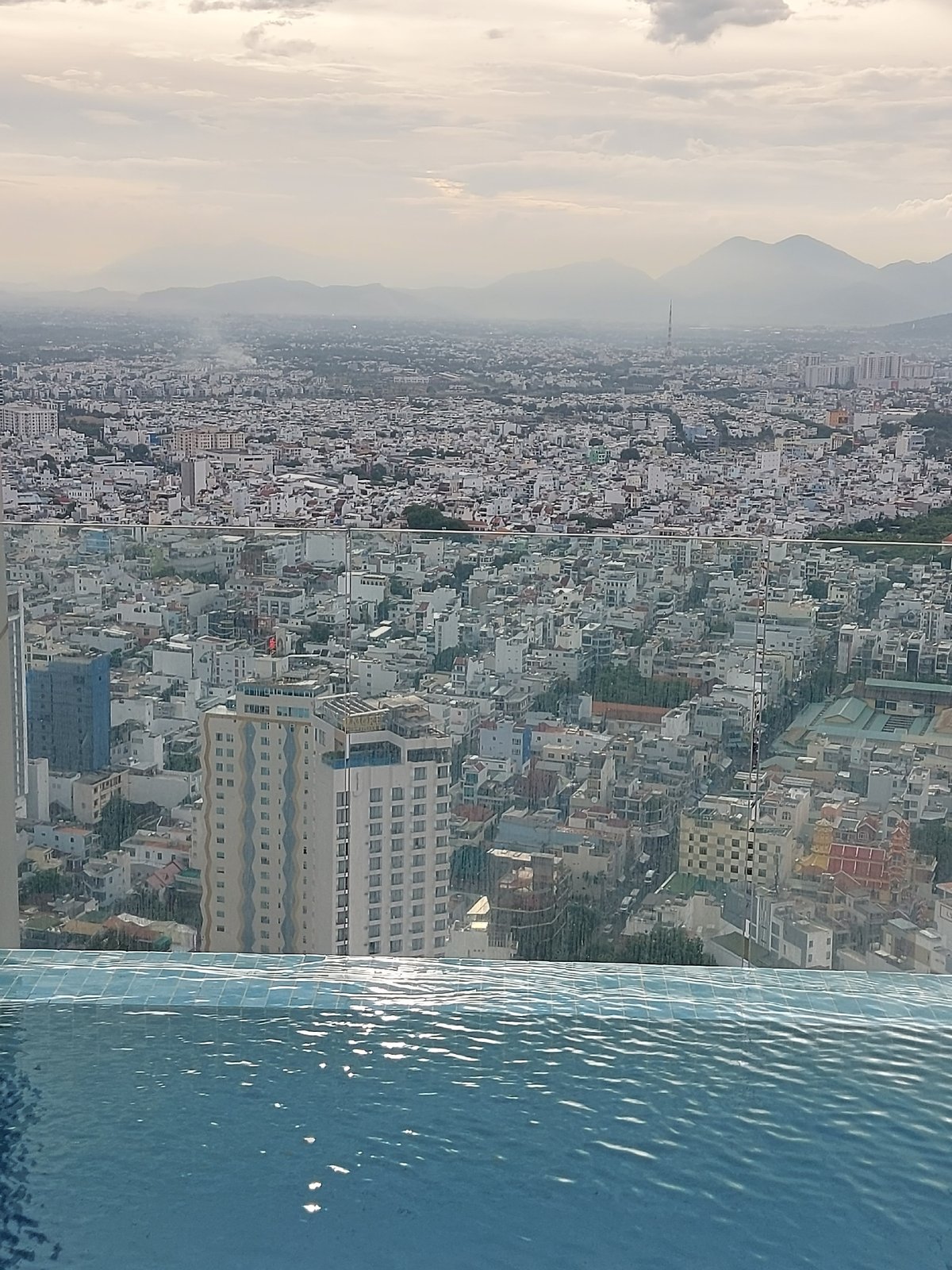 A day moving through Nha Trang's rooftops, streets, and cafes