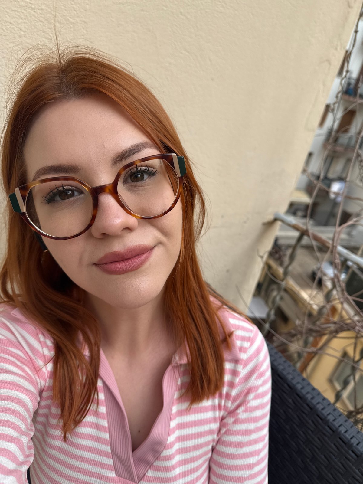 Woman takes selfie in Sanremo, Italy
