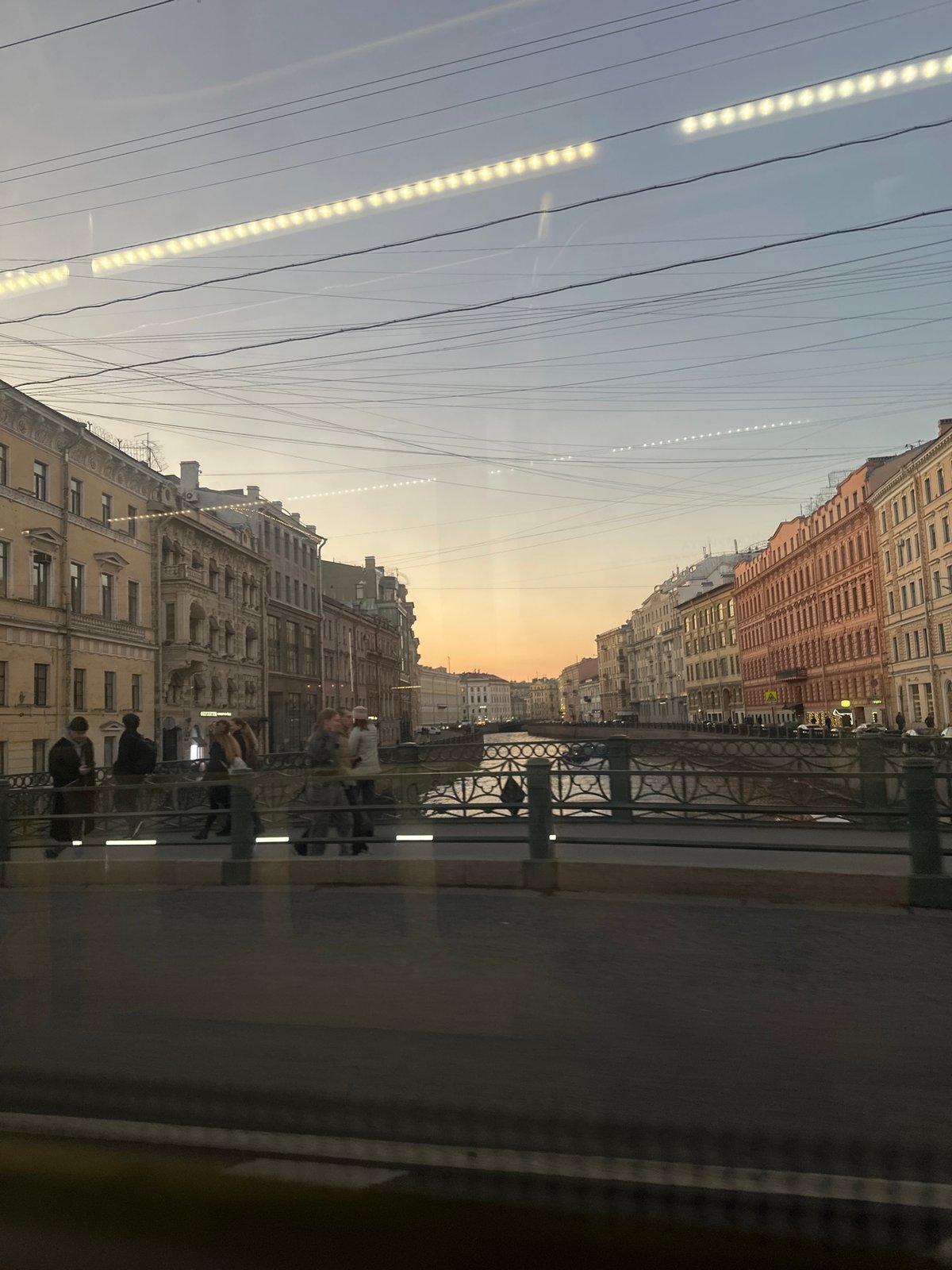 Canal view captured through window in Saint Petersburg