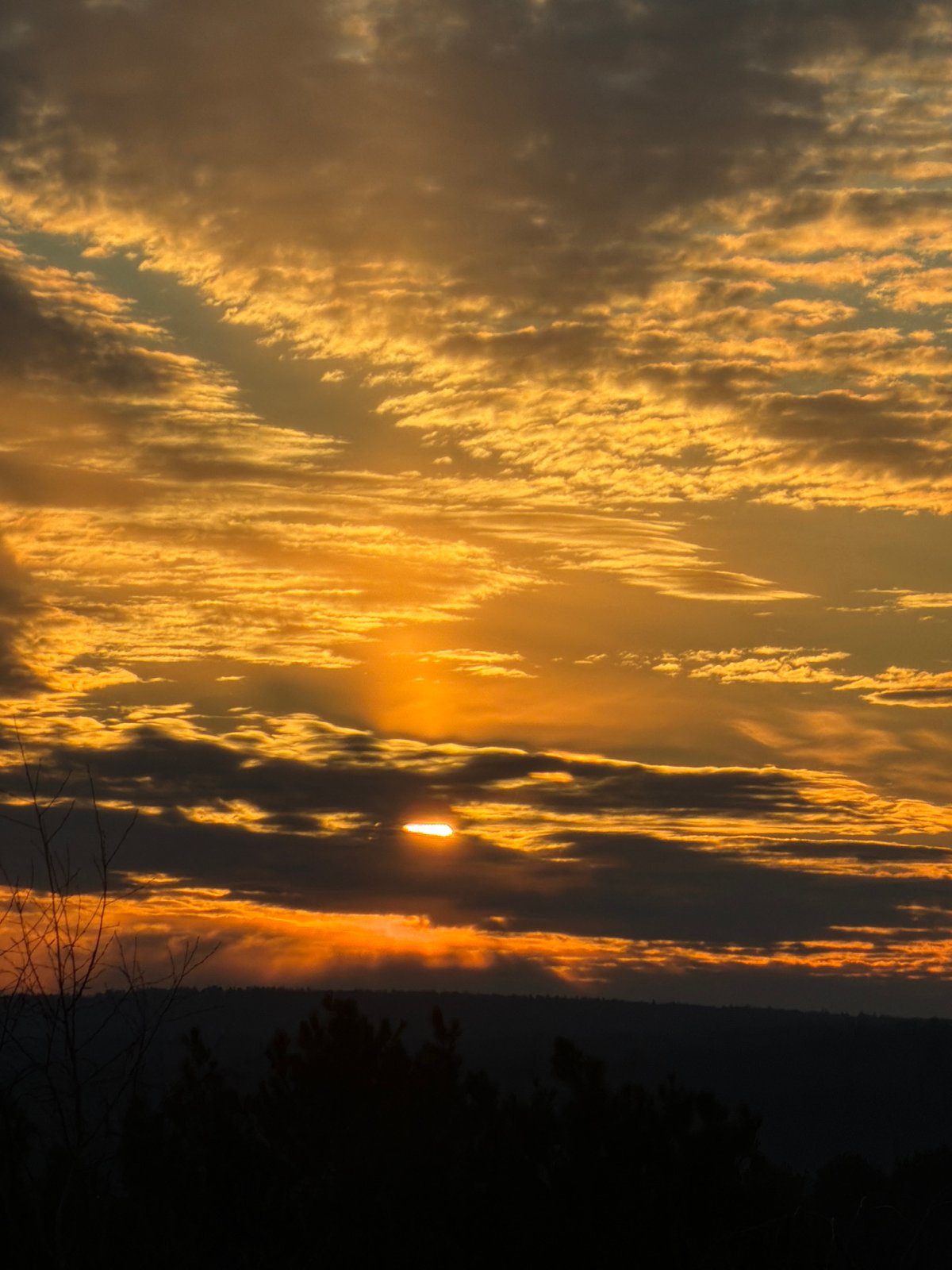 Golden sunset with clouds observed in Chaikovsky, Russia