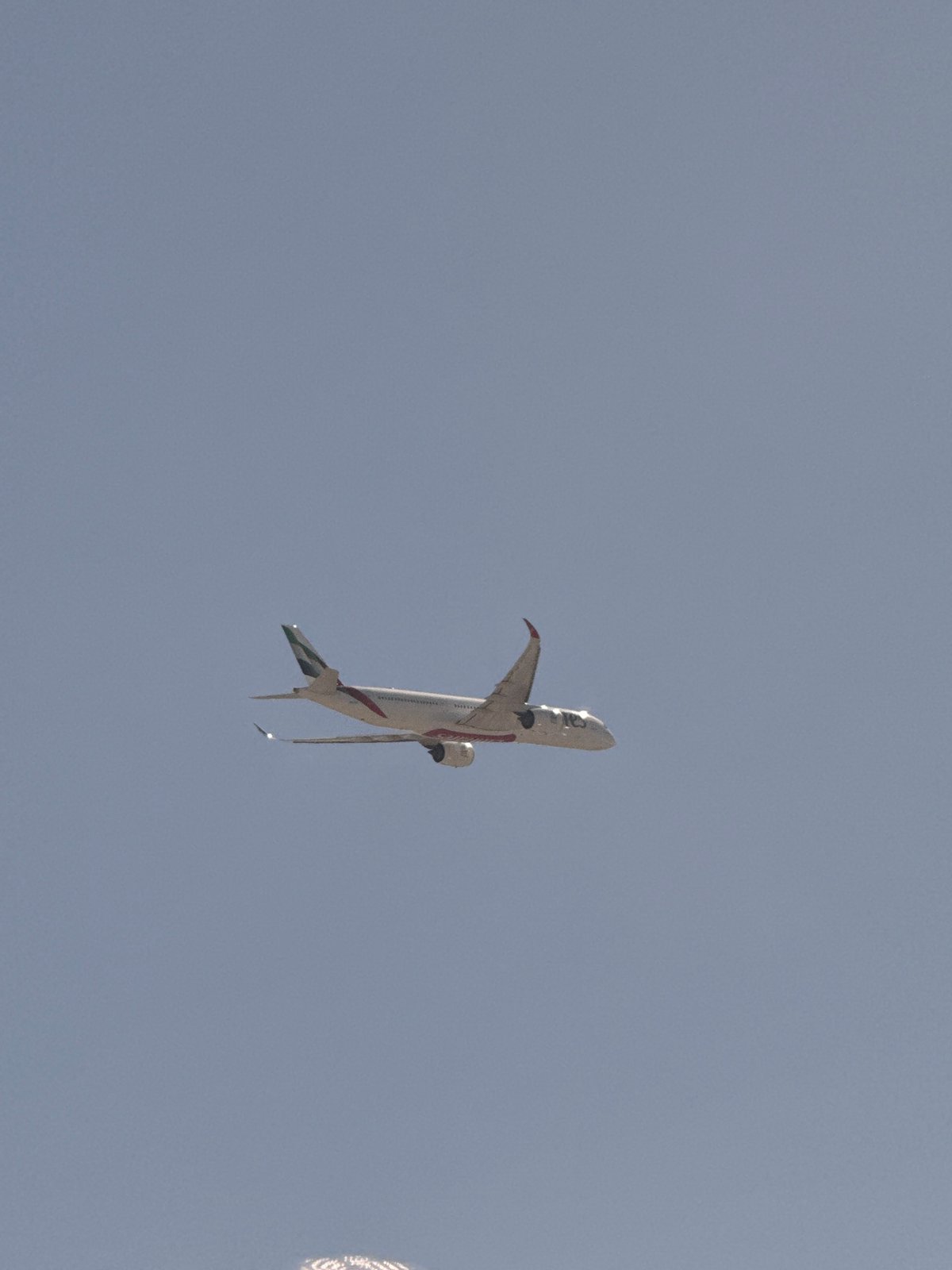 Traveler documents flydubai journey through Dubai International Airport