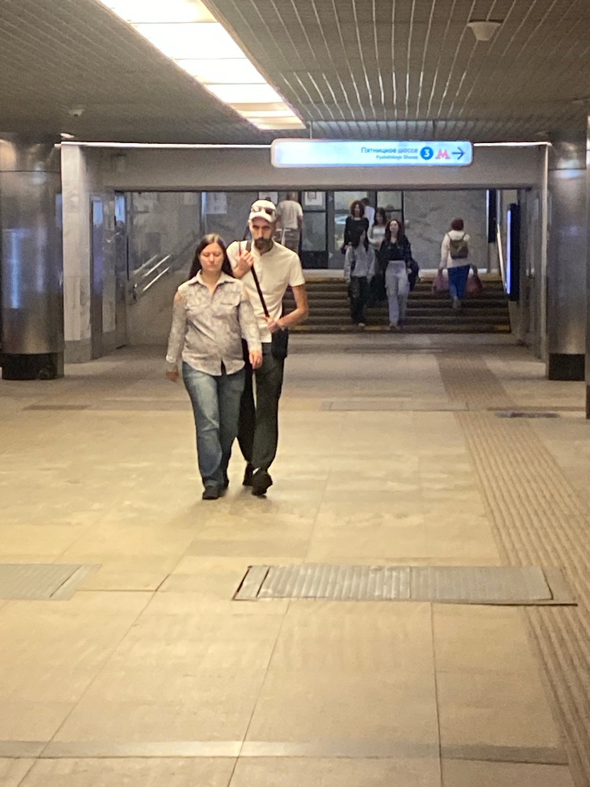 Afternoon street life around a Khimki metro hub