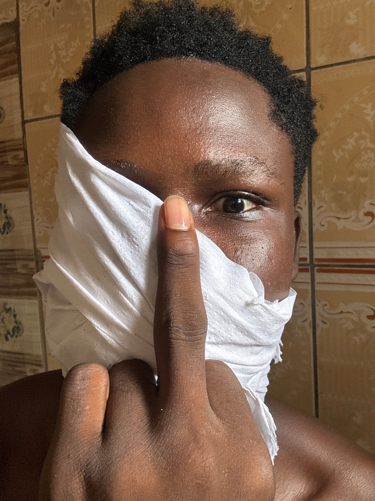 Portrait photography session documented in Ihiagwa, Nigeria street scenes