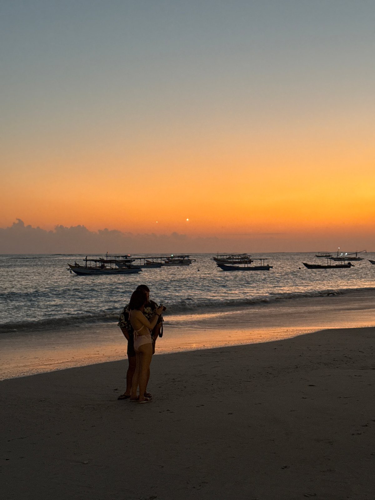 Sunset gathering observed at Kuta Beach, Indonesia
