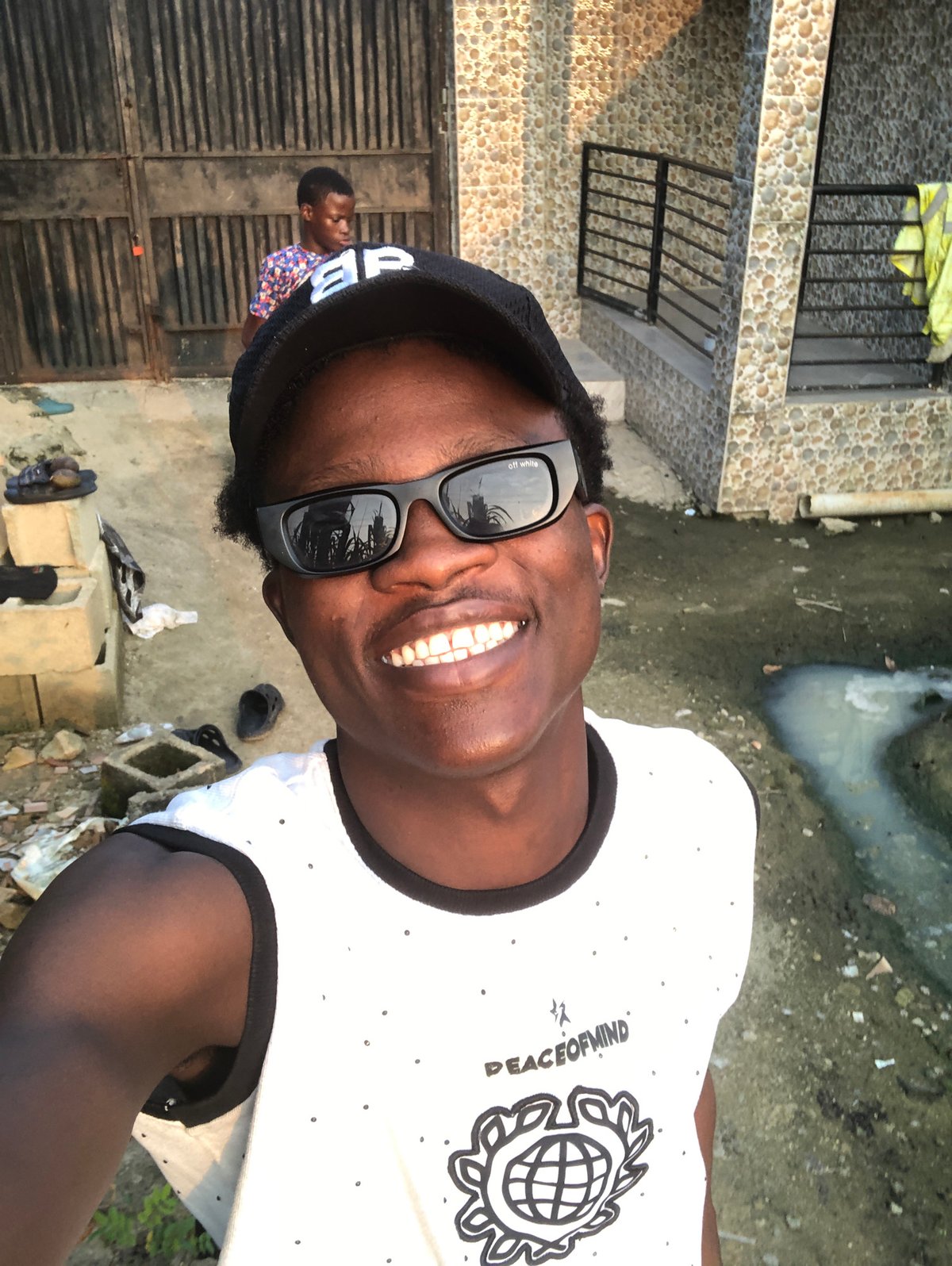 Selfie session in Ado, Nigeria with designer streetwear details