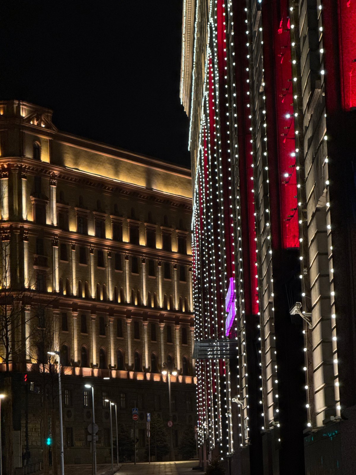 Rainy night scene documented in illuminated Moscow streets
