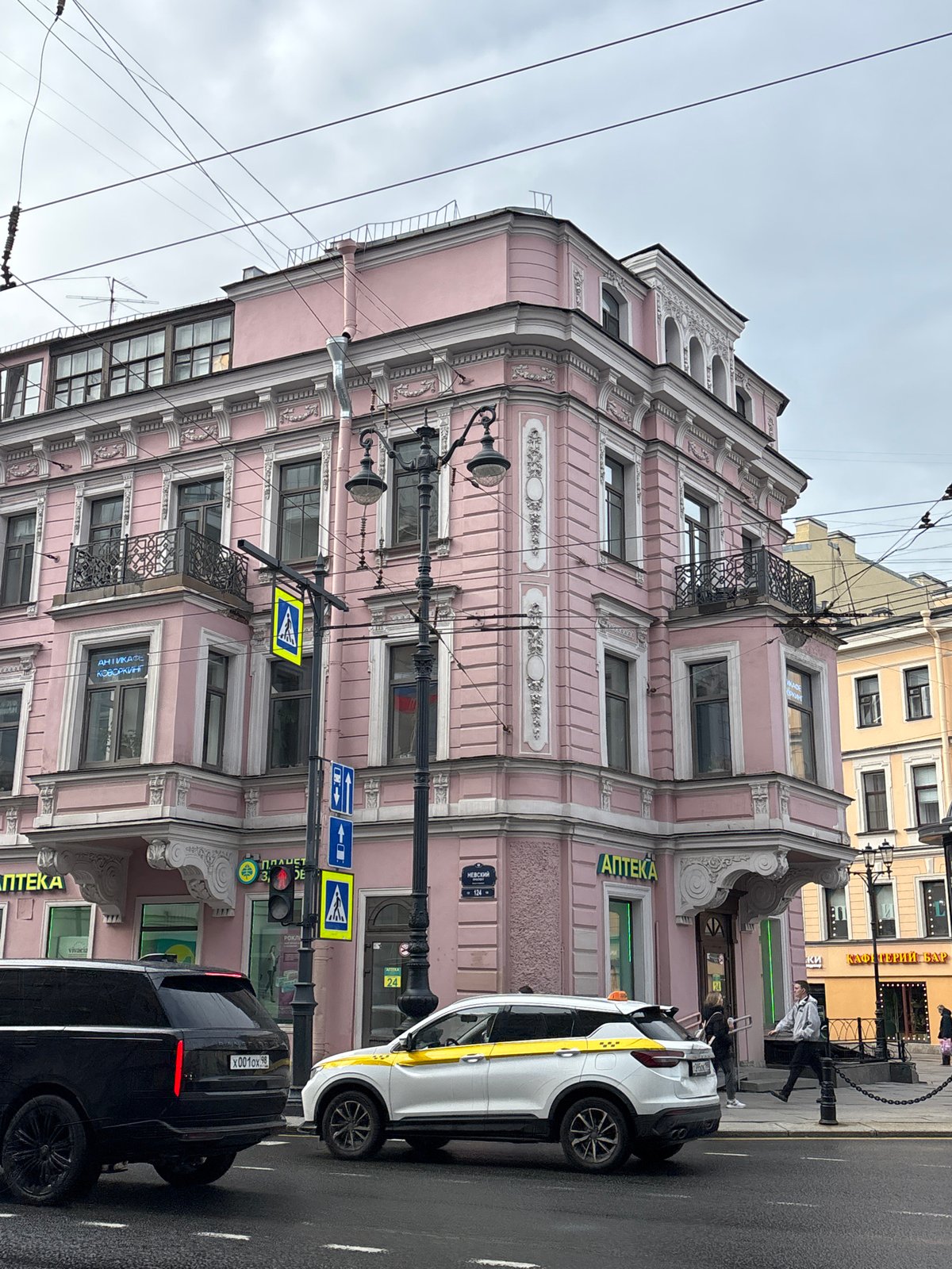 Tourist documents Saint Petersburg landmarks and flag-decorated streets