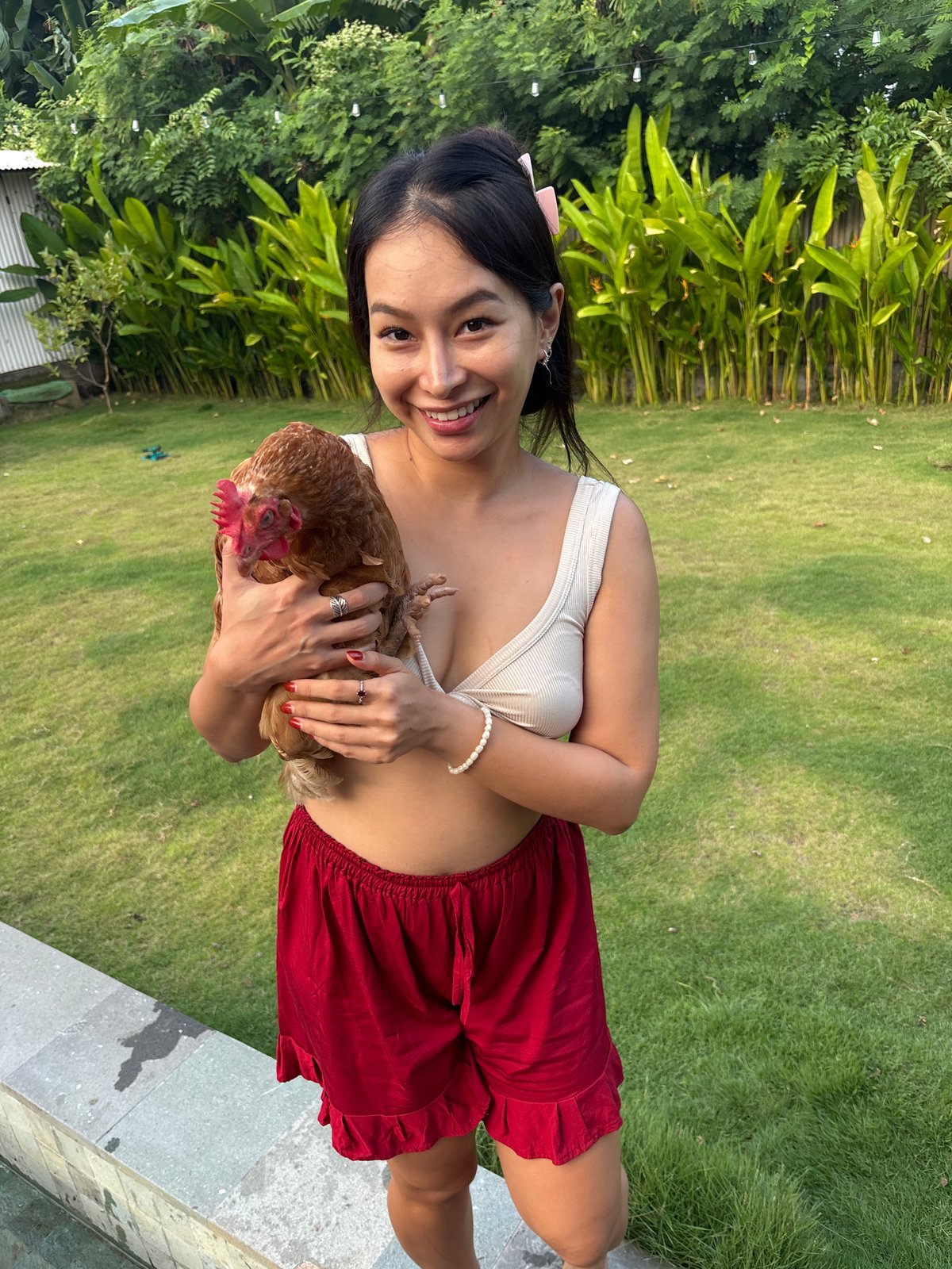 Lazy morning at a Bali villa with chickens, pool, and food