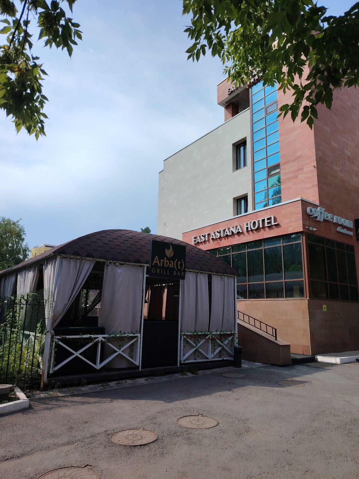 Street-level details from a quiet Astana neighborhood morning