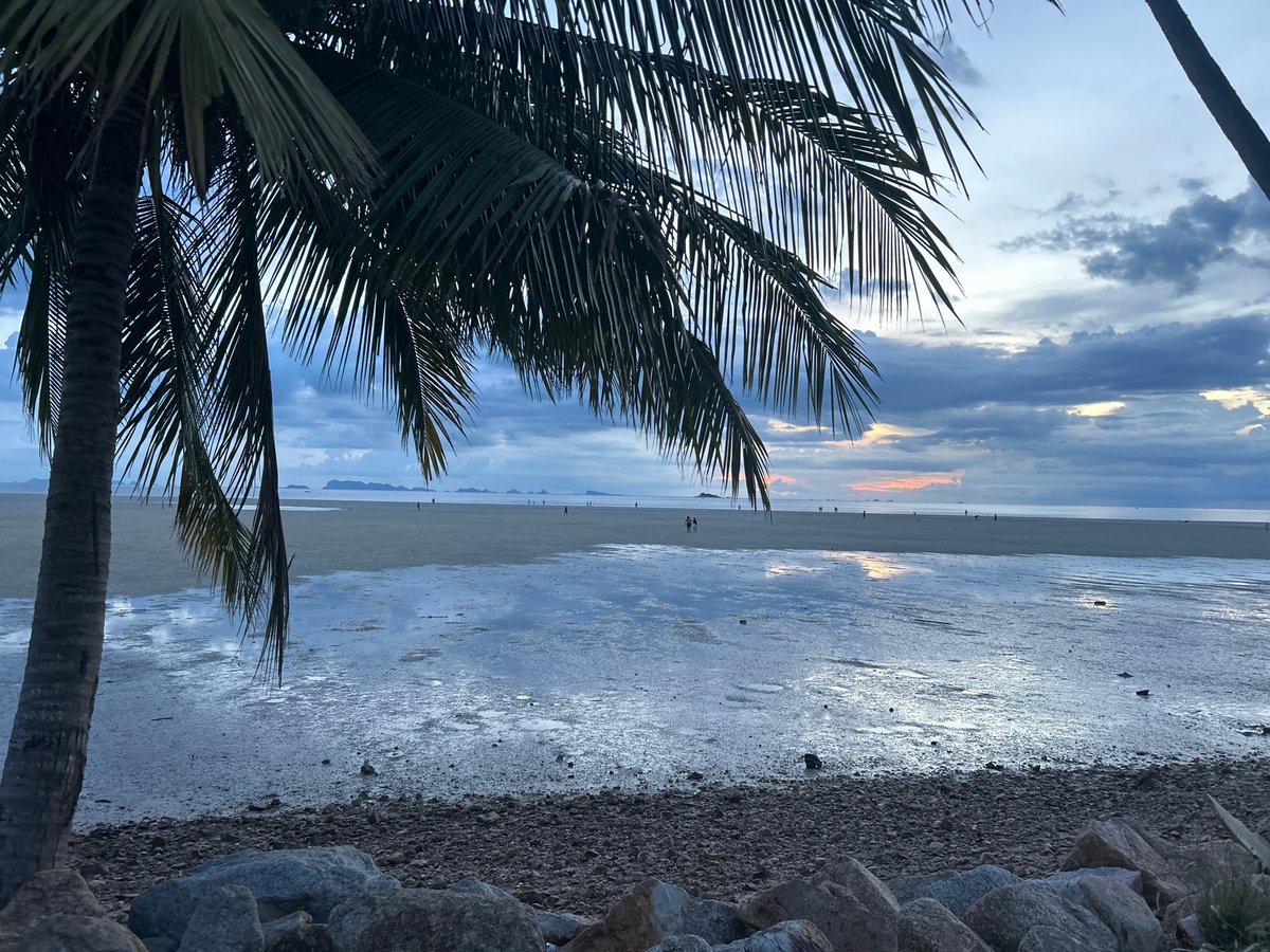 Dusk settling over a quiet Koh Phangan shoreline