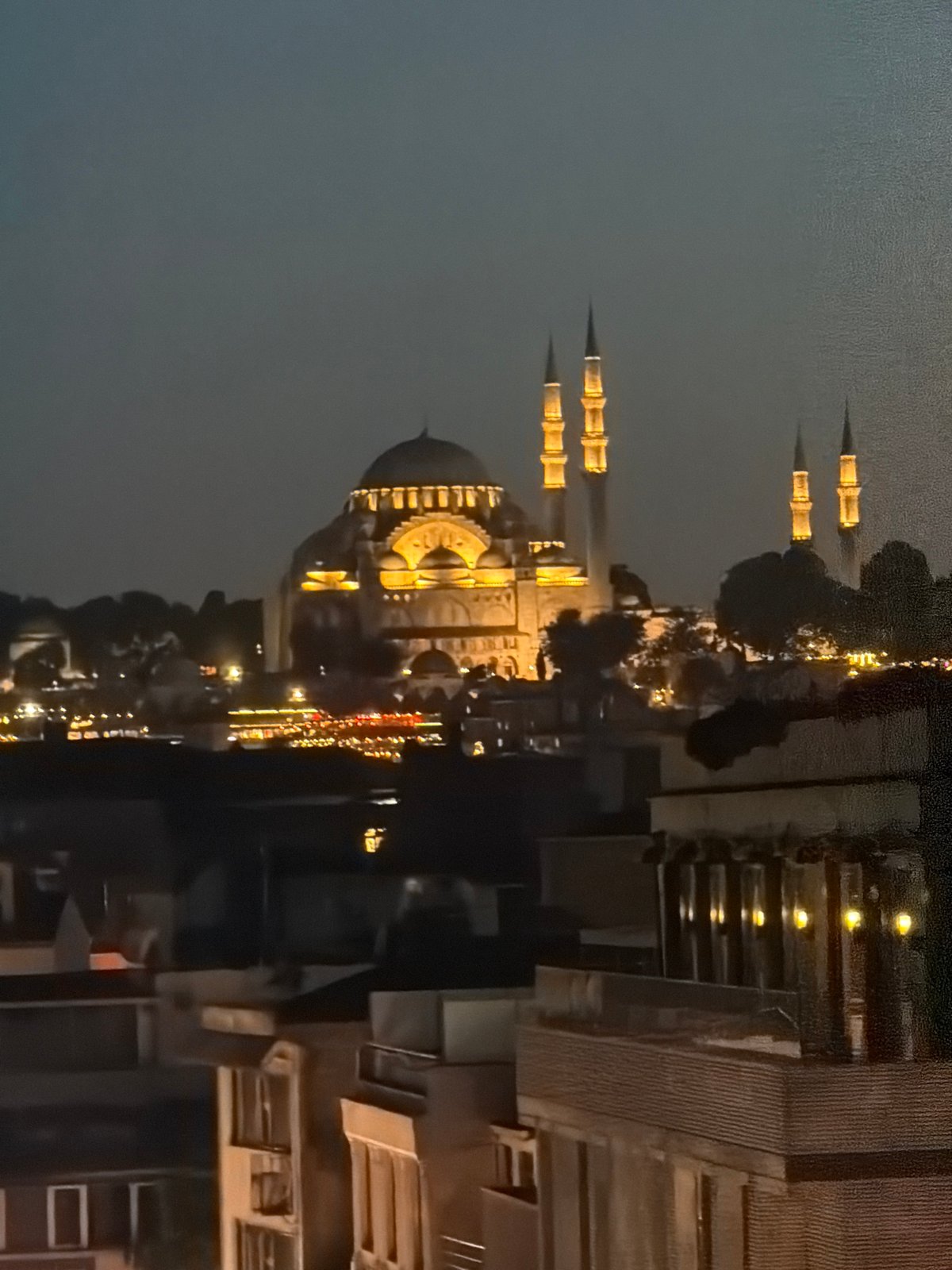 Evening social life unfolds across Beyoğlu's rooftops and venues