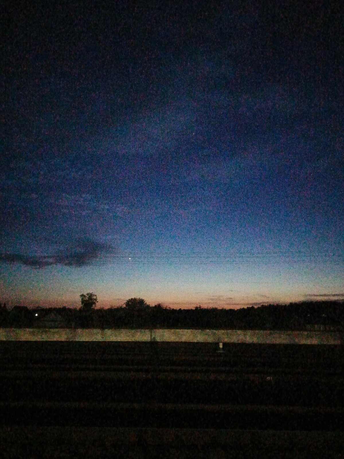 Evening twilight scenes captured across rural Лосева, Belarus