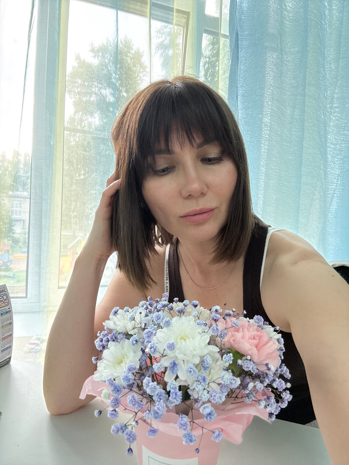 Lazy morning at home in Chaikovsky — flowers, coffee, skincare