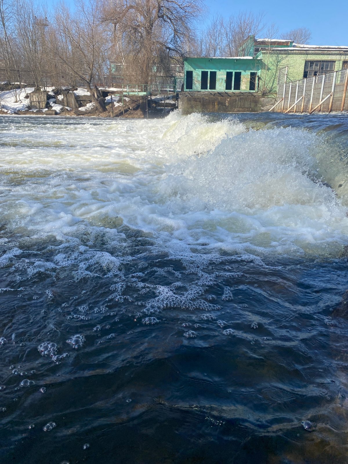 Waterfall and fishing activity documented in Postol, Russia