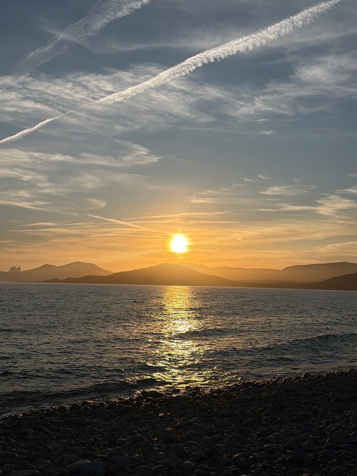 Mediterranean sunset witnessed from Sant Josep beach, Spain