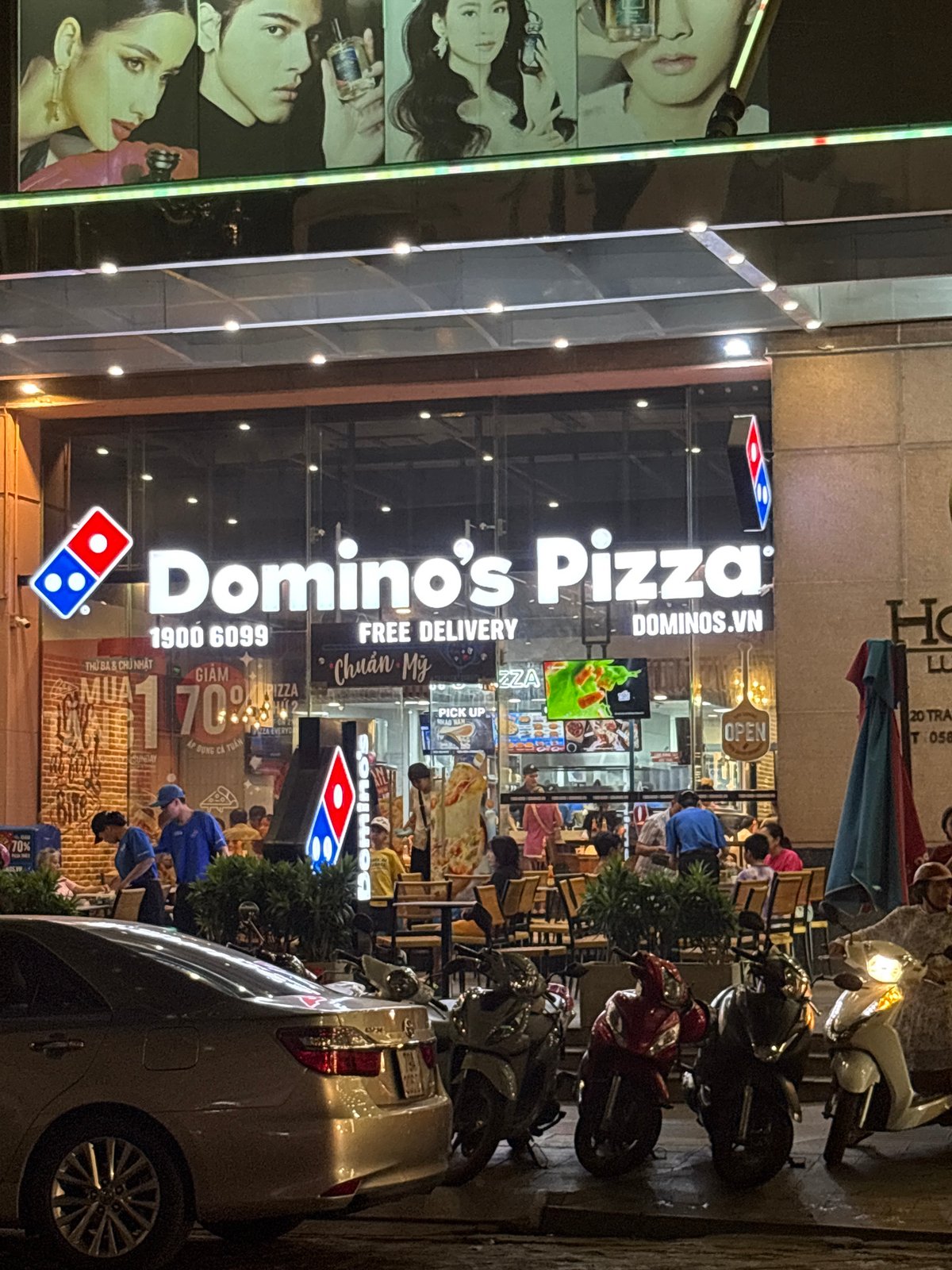 Nighttime commercial district activity captured in Nha Trang Ward