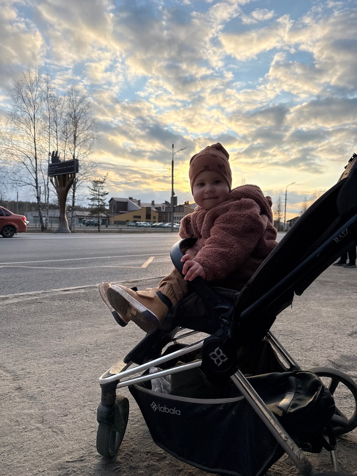Child and woman photographed on public bus in Zhukovo